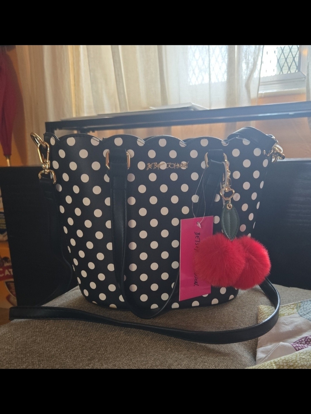 Betsey Johnson Black and White Polka Dot Crossbody with Red Pom Charm